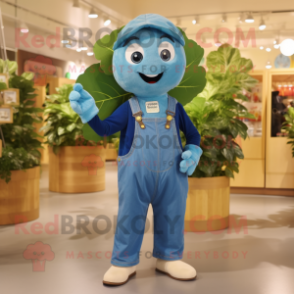 Sky Blue Spinach mascot costume character dressed with a Dungarees and Brooches