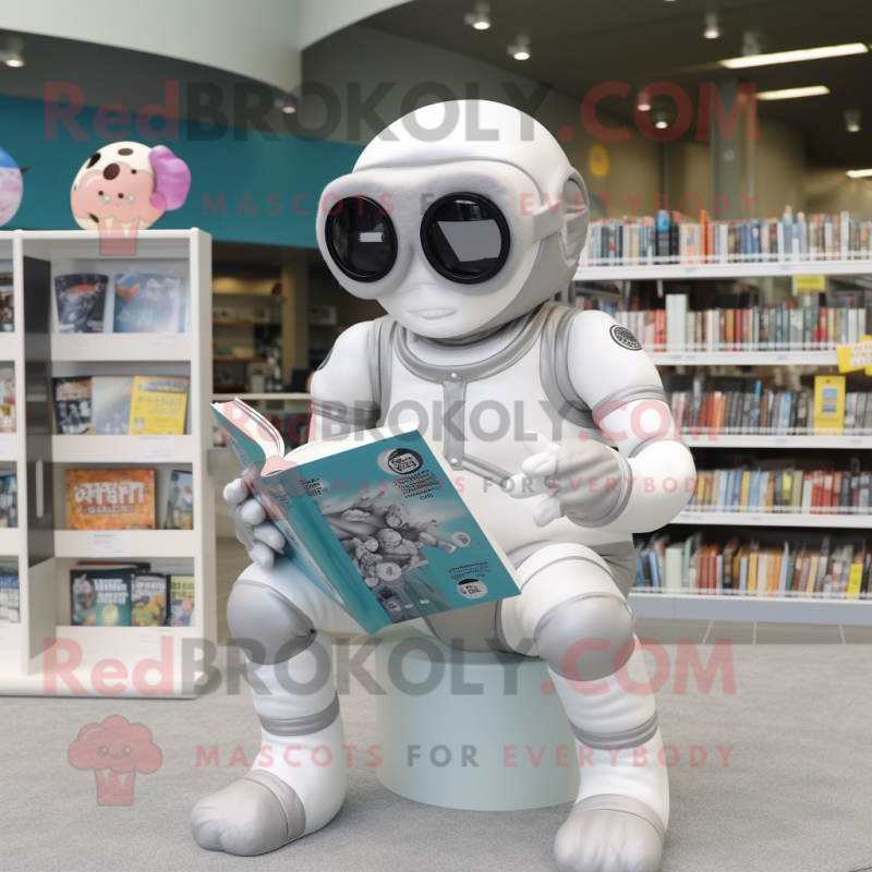 Gray Astronaut mascot costume character dressed with a One-Piece Swimsuit and Reading glasses Gray Astronaut mascot costume character dressed with a One-Piece Swimsuit and Reading glasses