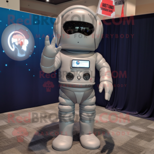 Gray Astronaut mascot costume character dressed with a One-Piece Swimsuit and Reading glasses