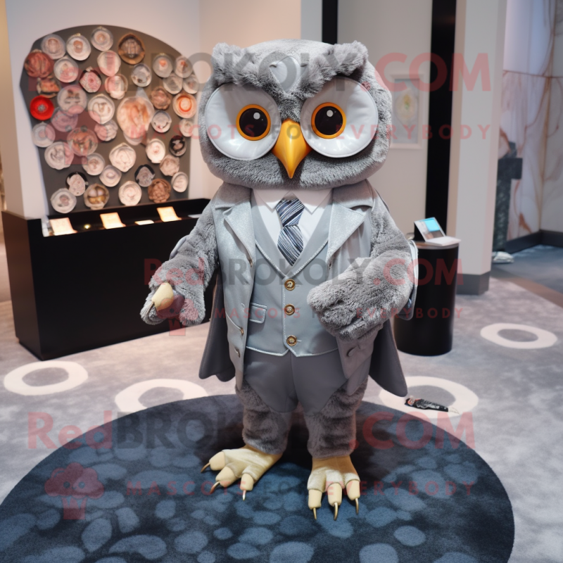 Silver Owl mascot costume character dressed with a Suit and Coin purses