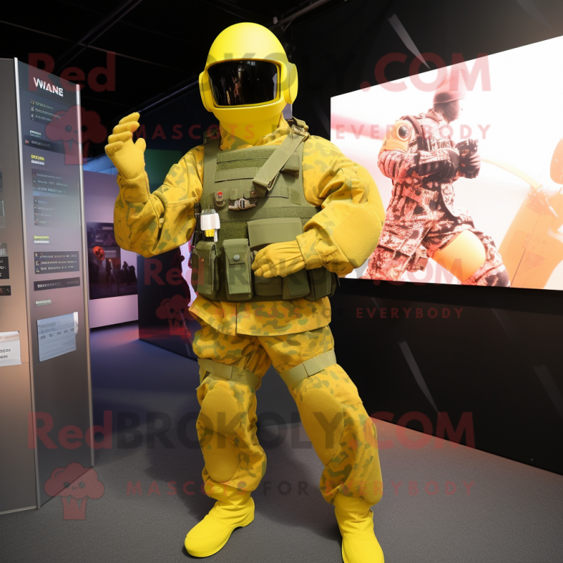 Yellow Para Commando mascot costume character dressed with a Playsuit and Foot pads Yellow Para Commando mascot costume character dressed with a Playsuit and Foot pads