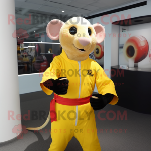 Yellow Rat mascot costume character dressed with a Rash Guard and Belts