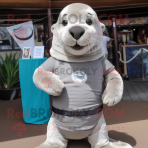 Silver Sea Lion mascot costume character dressed with a Henley Tee and Belts