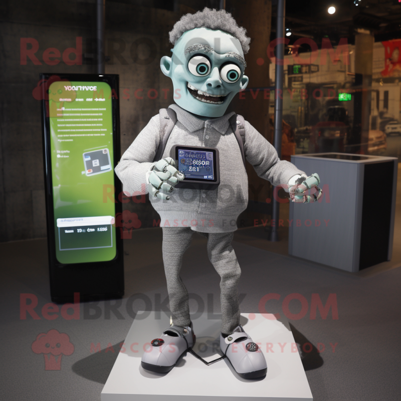 Silver Frankenstein mascot costume character dressed with a Cardigan and Smartwatches