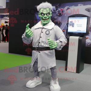 Silver Frankenstein mascot costume character dressed with a Cardigan and Smartwatches
