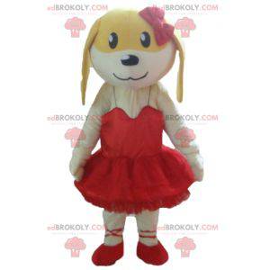 Mascote cachorro branco e amarelo com vestido vermelho -