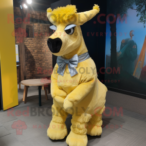 Yellow Llama mascot costume character dressed with a Cover-up and Bow ties