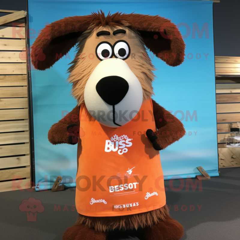 Rust Shepard'S Pie mascot costume character dressed with a Swimwear and Shawl pins Rust Shepard'S Pie mascot costume character dressed with a Swimwear and Shawl pins