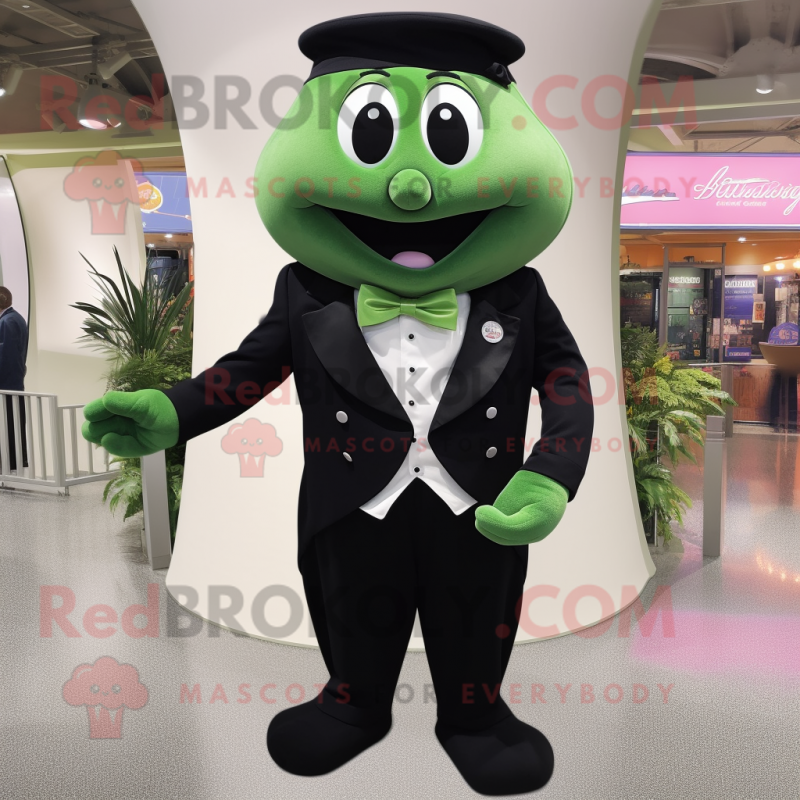 Navy Green Bean mascot costume character dressed with a Tuxedo and Suspenders Navy Green Bean mascot costume character dressed with a Tuxedo and Suspenders