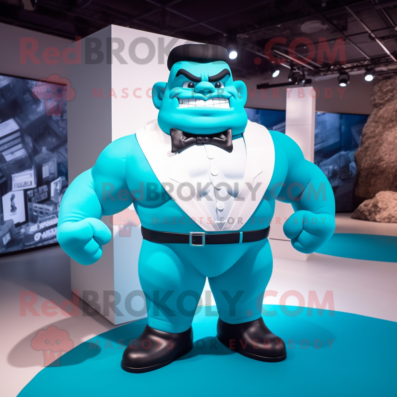 Cyan Strongman mascot costume character dressed with a Suit and Bow ties Cyan Strongman mascot costume character dressed with a Suit and Bow ties