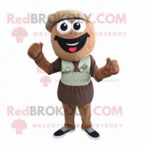 Brown Falafel mascot costume character dressed with a Bermuda Shorts and Caps