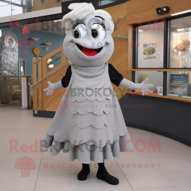 Gray Fish And Chips mascot costume character dressed with a A-Line Skirt and Shoe clips