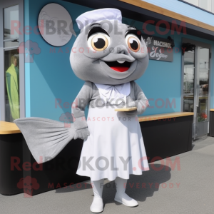 Gray Fish And Chips mascot costume character dressed with a A-Line Skirt and Shoe clips