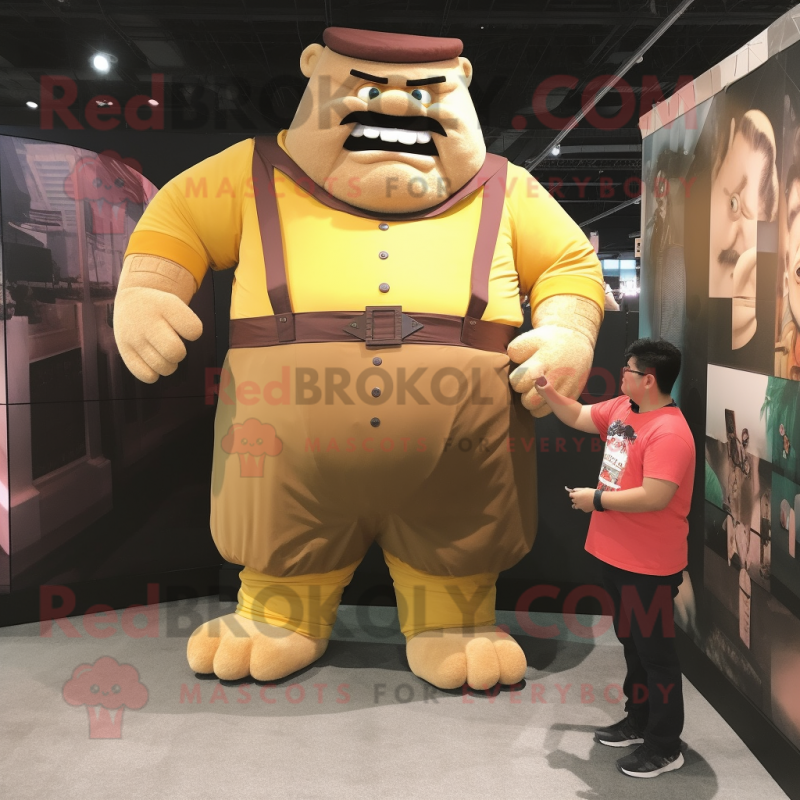 Gold Strongman mascot costume character dressed with a Corduroy Pants and Watches Gold Strongman mascot costume character dressed with a Corduroy Pants and Watches