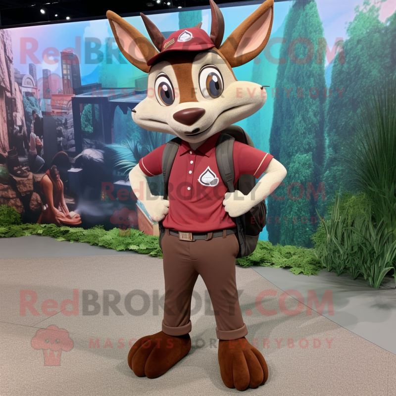 Maroon Gazelle mascot costume character dressed with a Cargo Shorts and Backpacks Maroon Gazelle mascot costume character dressed with a Cargo Shorts and Backpacks