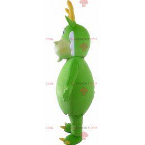 Green dragon mascot white and yellow green creature -