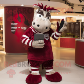 Maroon Quagga mascot costume character dressed with a Henley Tee and Clutch bags