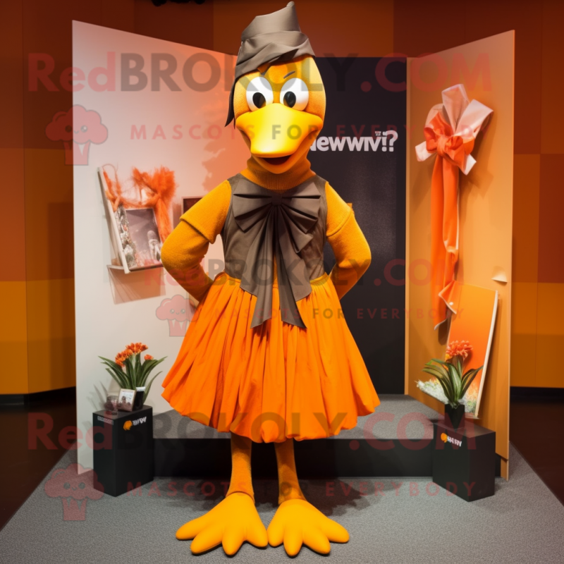 Orange Crow mascot costume character dressed with a Maxi Skirt and Bow ties Orange Crow mascot costume character dressed with a Maxi Skirt and Bow ties
