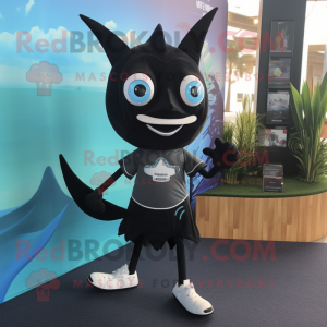 Black Swordfish mascot costume character dressed with a Running Shorts and Lapel pins