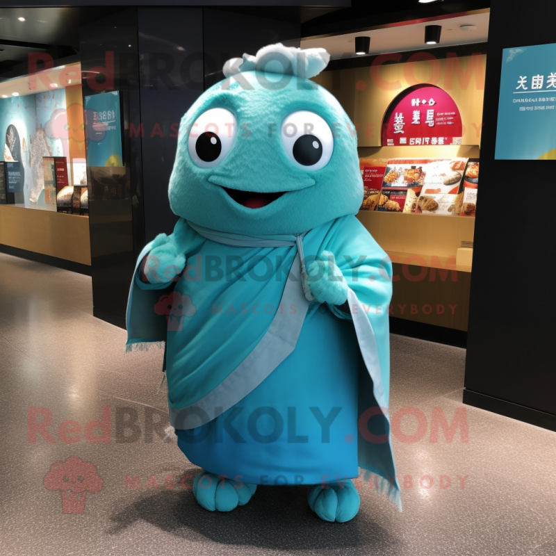 Turquoise Dim Sum mascot costume character dressed with a T-Shirt and Shawl pins Turquoise Dim Sum mascot costume character dressed with a T-Shirt and Shawl pins