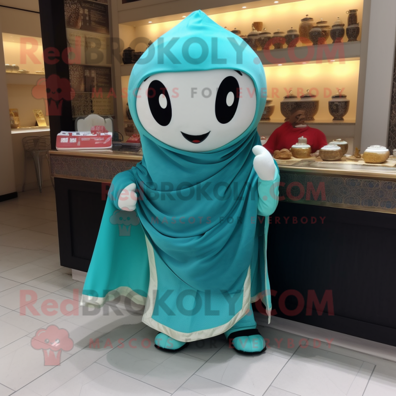Turquoise Dim Sum mascot costume character dressed with a T-Shirt and Shawl pins Turquoise Dim Sum mascot costume character dressed with a T-Shirt and Shawl pins