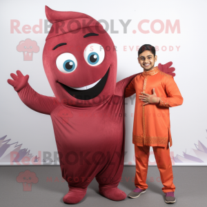 Maroon Tikka Masala mascot costume character dressed with a Jumpsuit and Wraps