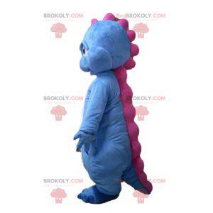 Mascotte de dinosaure bleu blanc et rose de dragon -