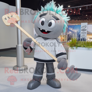 Gray Ice Hockey Stick mascot costume character dressed with a Dress Shirt and Hairpins