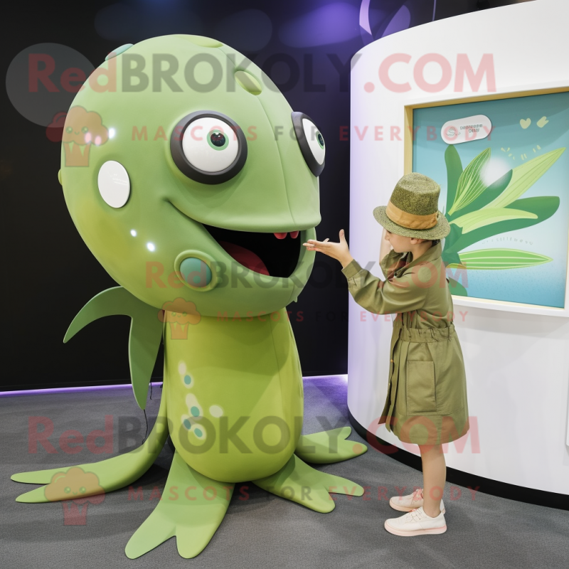 Olive Stingray mascot costume character dressed with a Playsuit and Watches Olive Stingray mascot costume character dressed with a Playsuit and Watches