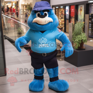 Blue Commando mascot costume character dressed with a V-Neck Tee and Suspenders