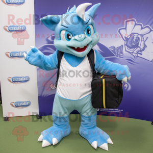 Sky Blue Chupacabra mascot costume character dressed with a Bermuda Shorts and Messenger bags