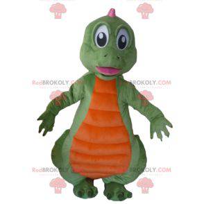 Mascota dinosaurio verde naranja y rosa - Redbrokoly.com