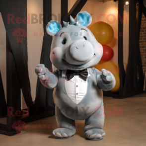 Gray Rhinoceros mascot costume character dressed with a Flare Jeans and Bow ties