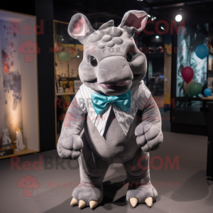 Gray Rhinoceros mascot costume character dressed with a Flare Jeans and Bow ties