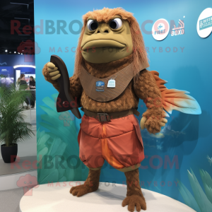 Brown Betta Fish mascot costume character dressed with a Board Shorts and Belts