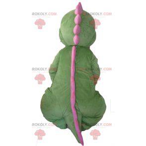 Mascote dinossauro verde laranja e rosa - Redbrokoly.com