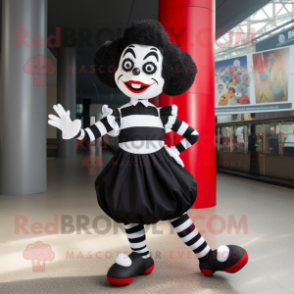 Black Mime mascot costume character dressed with a Dress and Foot pads