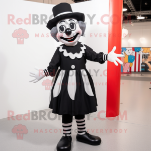 Black Mime mascot costume character dressed with a Dress and Foot pads