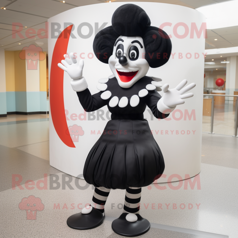 Black Mime mascot costume character dressed with a Dress and Foot pads