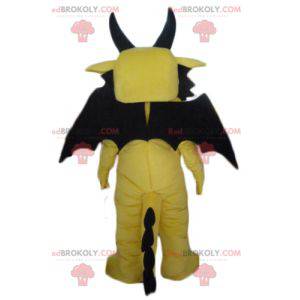 Funny and impressive yellow and black dragon mascot -