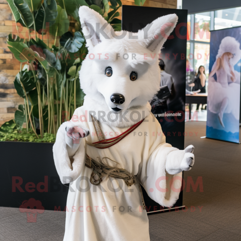 White Dingo mascot costume character dressed with a Wrap Dress and Headbands White Dingo mascot costume character dressed with a Wrap Dress and Headbands