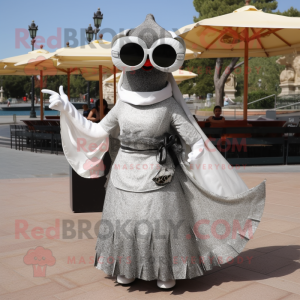 Silver Paella mascot costume character dressed with a Wrap Dress and Sunglasses