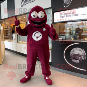 Maroon Croissant mascot costume character dressed with a Jumpsuit and Digital watches
