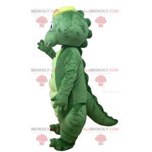 Mascote crocodilo dinossauro verde e amarelo - Redbrokoly.com