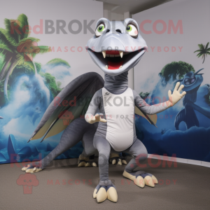 Silver Dimorphodon mascot costume character dressed with a Running Shorts and Ties