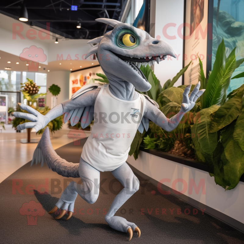 Silver Dimorphodon mascot costume character dressed with a Running Shorts and Ties