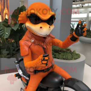 Orange Geckos mascot costume character dressed with a Biker Jacket and Gloves