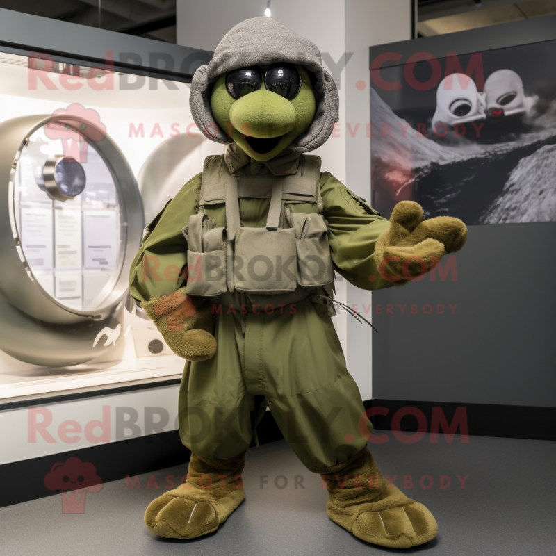 Olive Special Air Service mascot costume character dressed with a Circle Skirt and Mittens Olive Special Air Service mascot costume character dressed with a Circle Skirt and Mittens