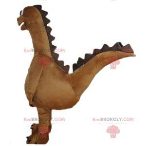 Grande mascote gigante de dinossauro marrom e branco -
