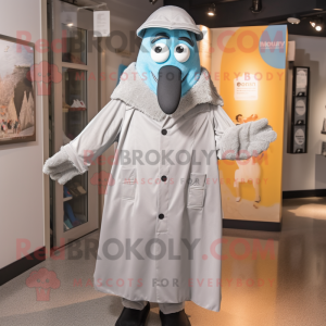 Silver Aglet mascot costume character dressed with a Raincoat and Cufflinks